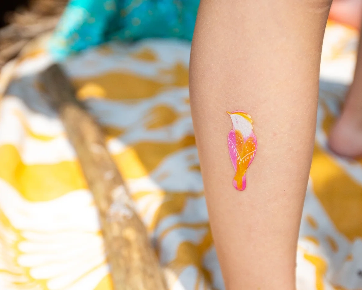 Child bird tattoo